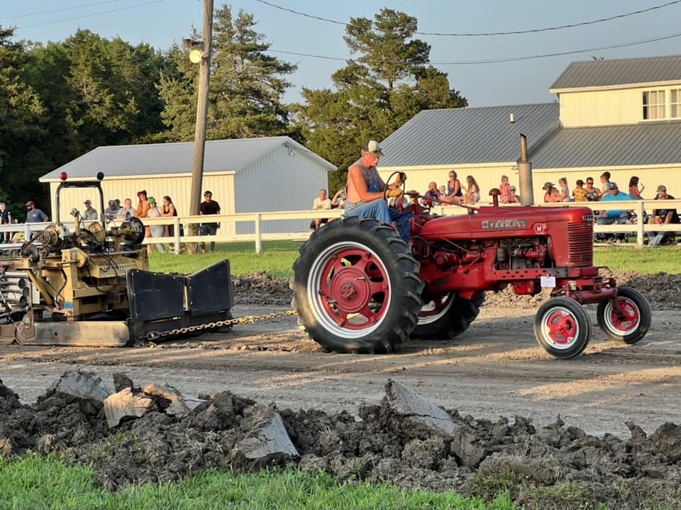 A contestant competes in the tractor pull.